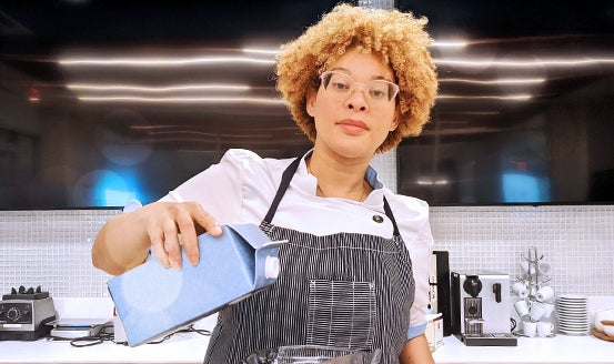 A woman with a carton of milk